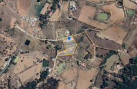 Imagen aérea del terreno en venta ubicado en el paraje Tichculu, Diximoxi, Atlacomulco, Estado de México, delimitado en color amarillo.